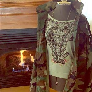 Combo outfit, necklace, field jacket, shirt.